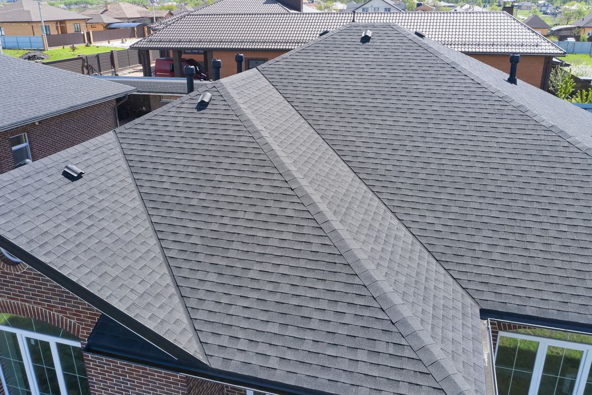 Architectural asphalt shingle roof planes on a residential home